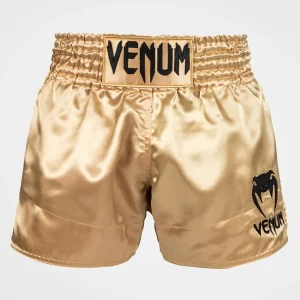 7bf7e1c2e4636e5317d9c0796214ae39775d7526_SHORT_MUAYTHAI_CLASSIC_GOLD_01.jpgv1744110978 SHORT DE MUAY THAI VENUM CLASSIC -OR/NOIR